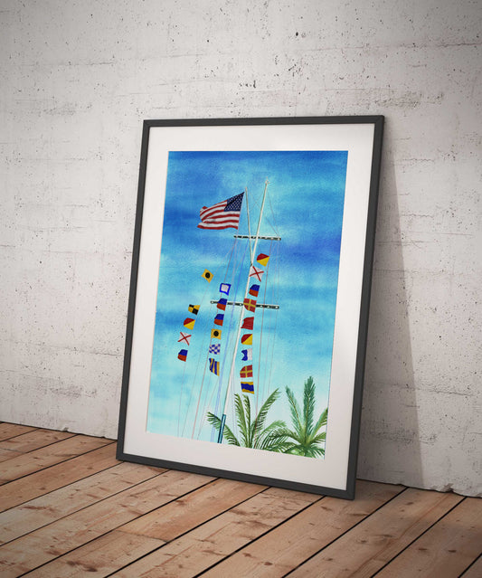 Funny nautical wall art with maritime signal flags spelling “I Love Peeing Overboard” – sky and palm tree scene from sailboat flagpole